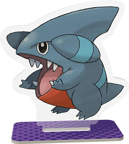 Pokemon Garchomp Figur in Kampfhaltung auf lila Basis.