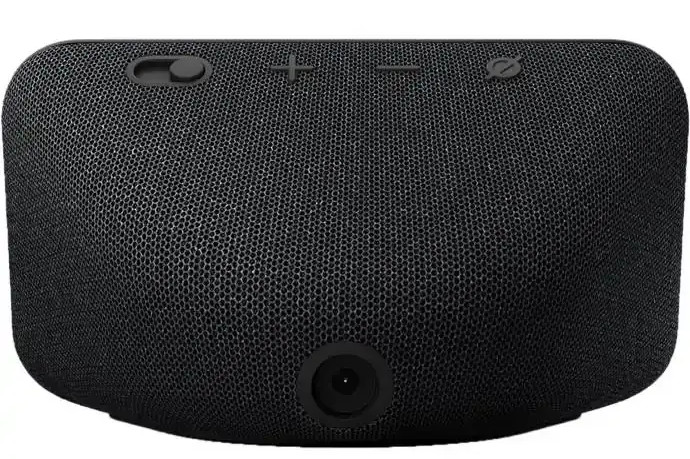 Tył czarnego urządzenia. Zawiera port zasilania, regulację głośności, przełącznik wyciszania.