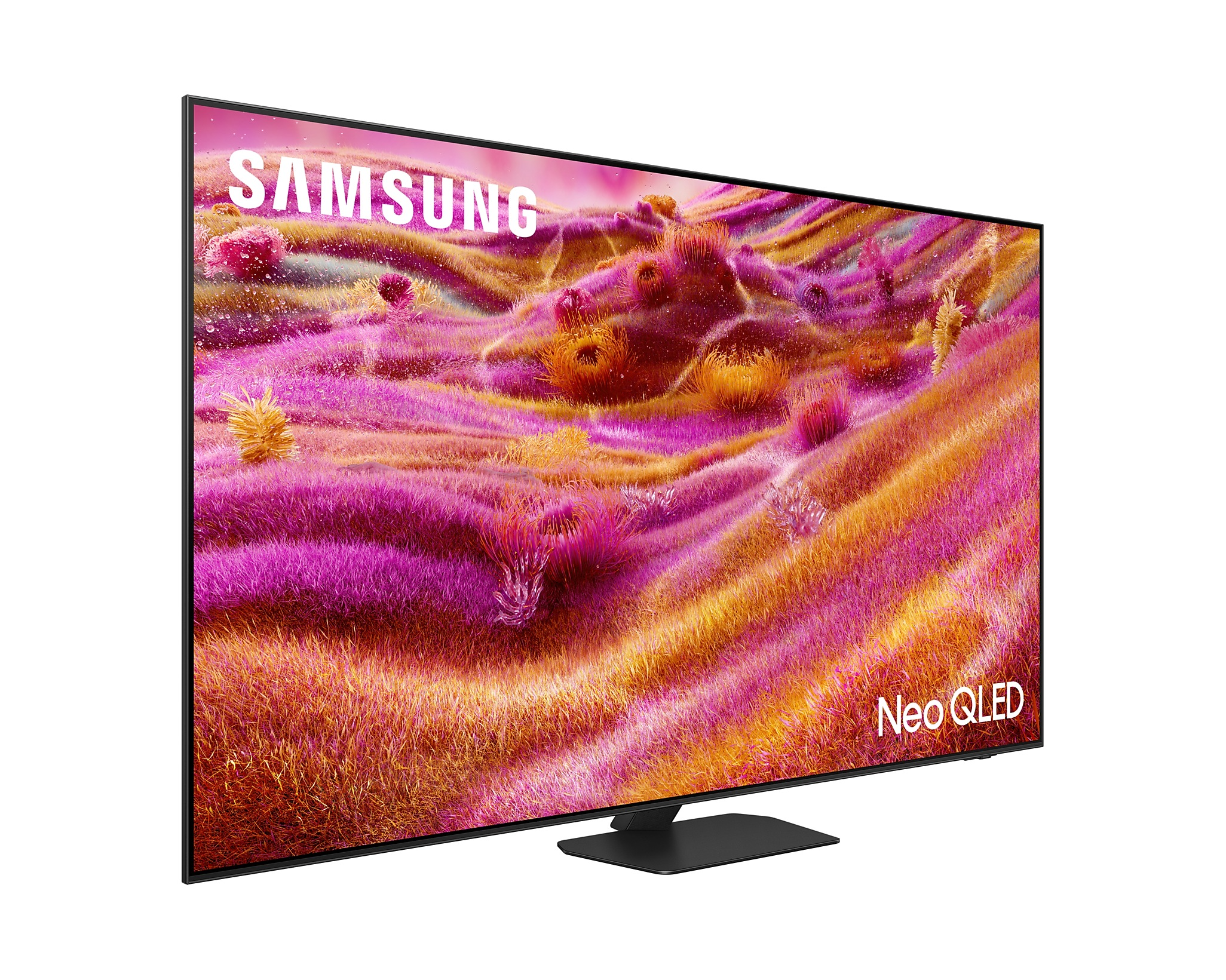 Samsung Neo QLED TV. A képernyő színes absztrakt képet mutat. A TV állványon van.