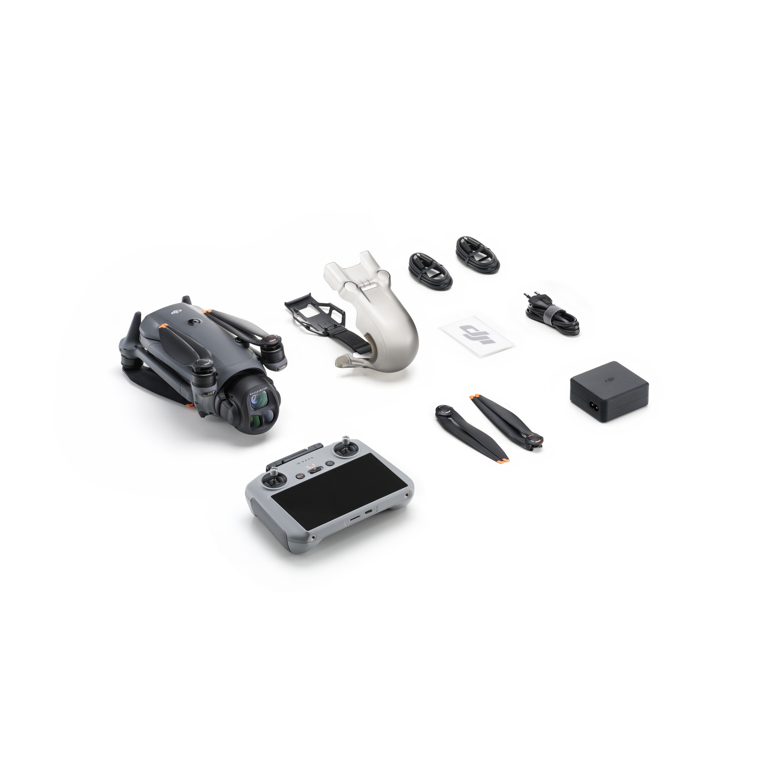 Drone and accessories. Includes remote, charger, propellers, and more.