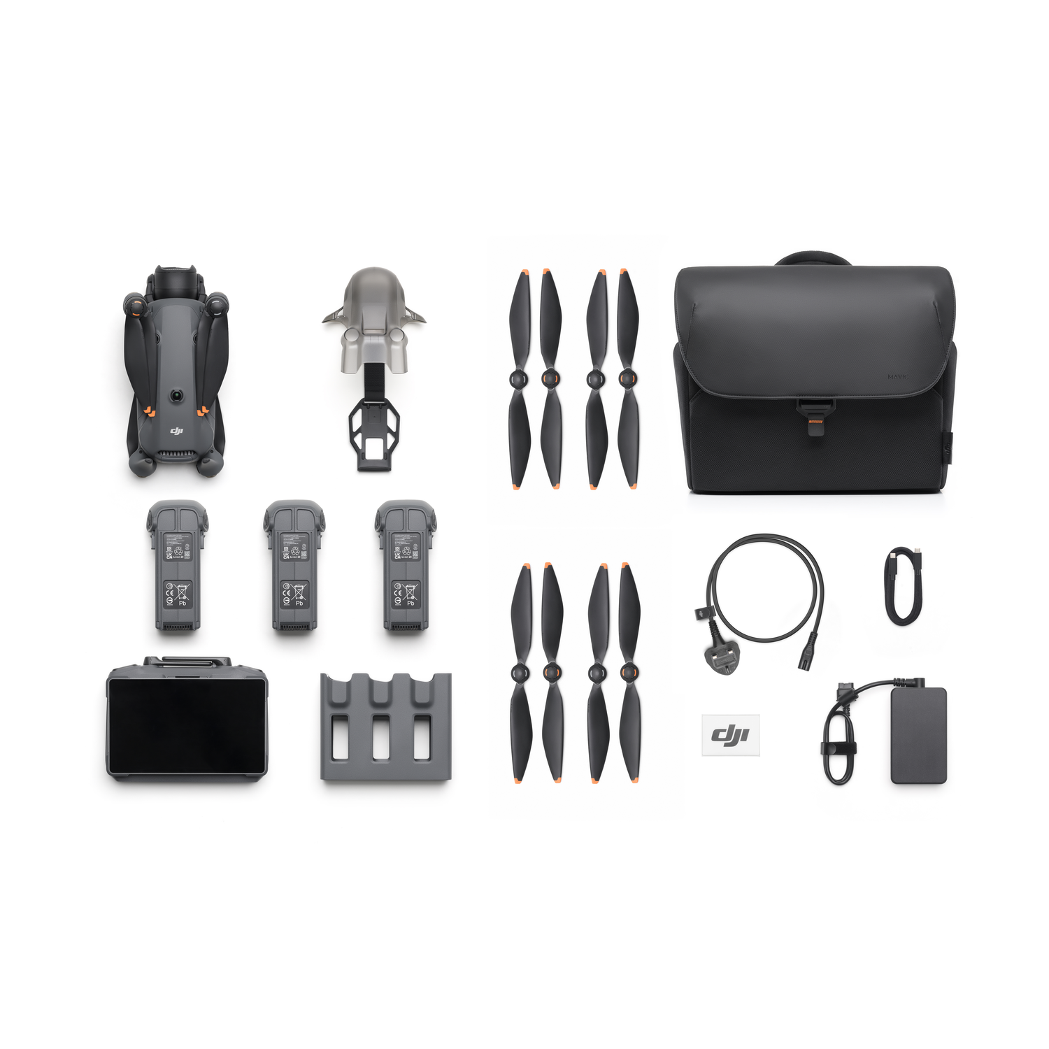 Various drone accessories are arranged. Includes batteries, propellers, a bag, and a charger.