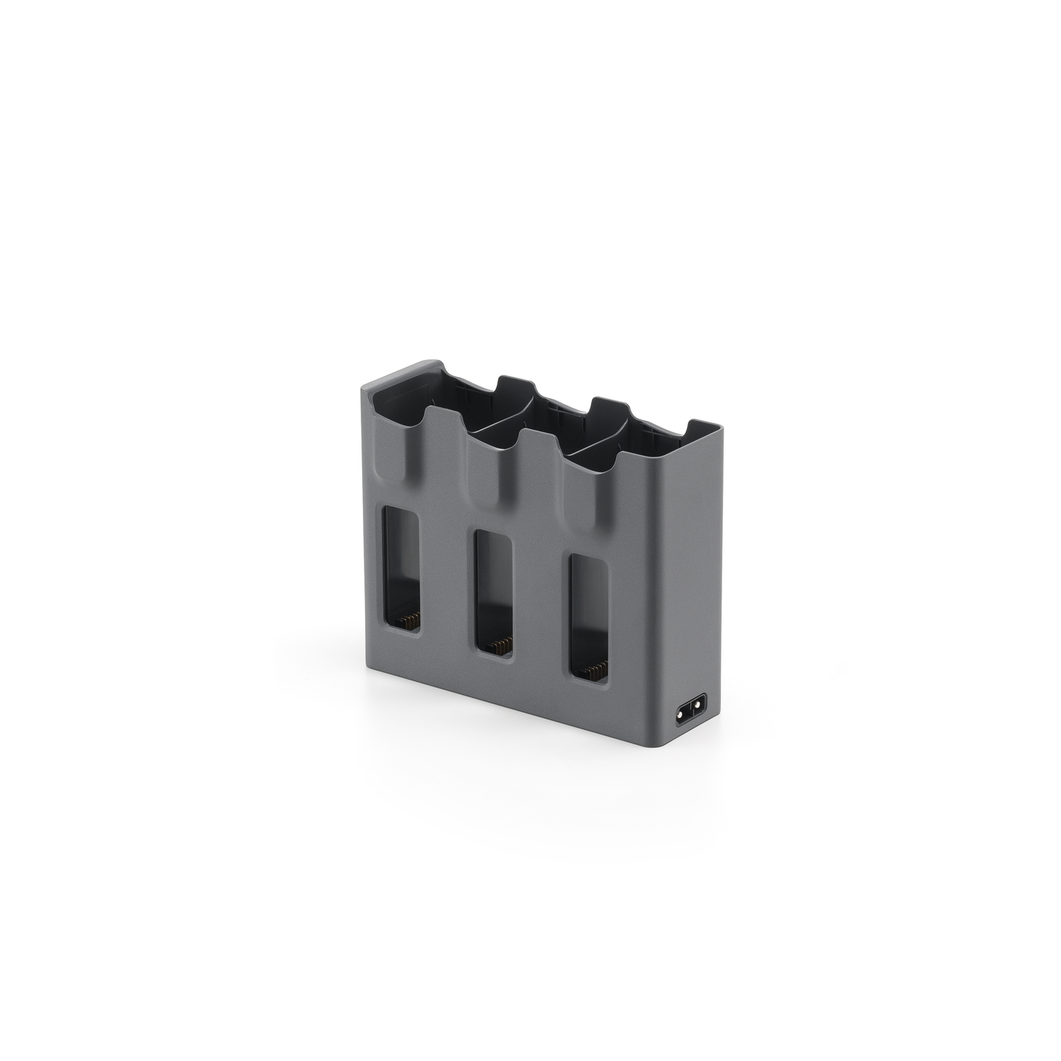 A grey charging station for drone batteries, with three slots.