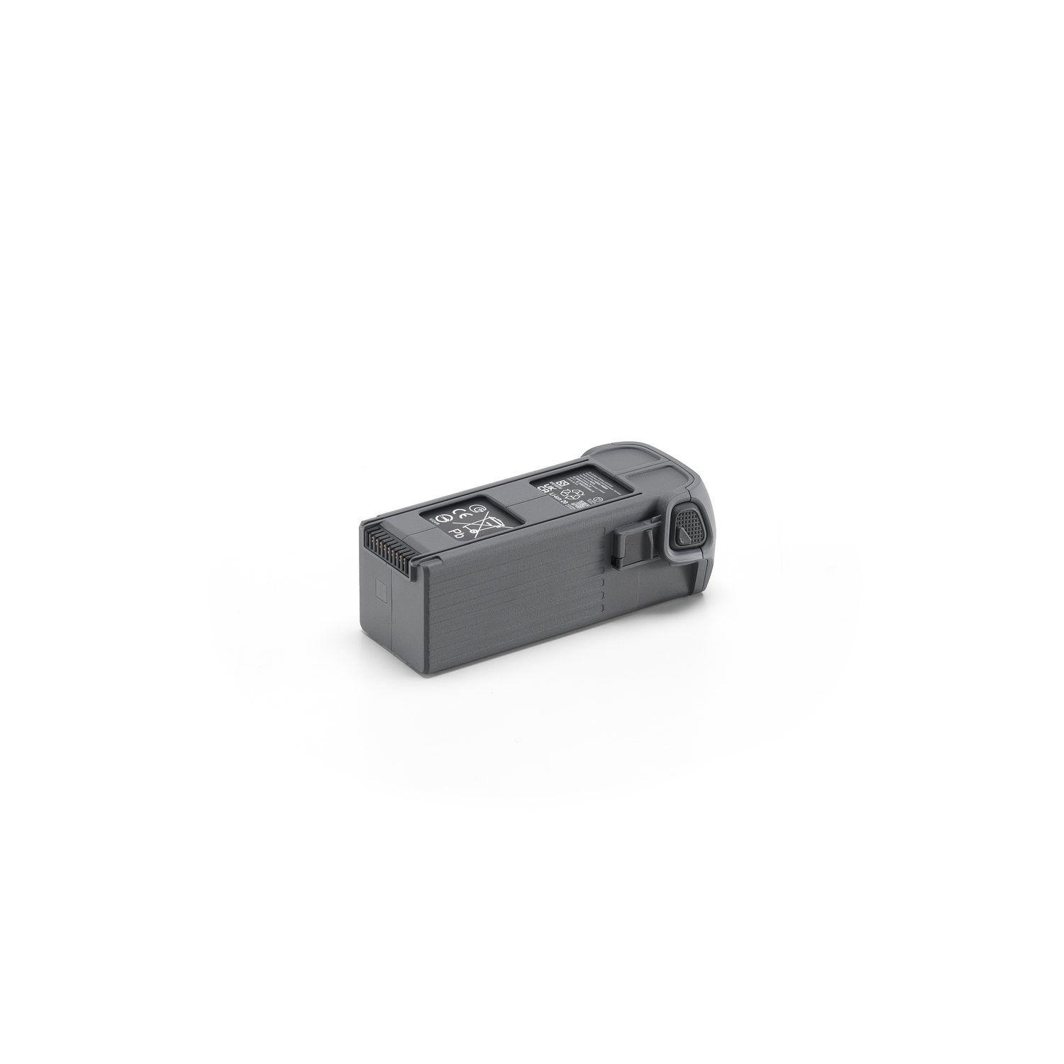 Een grijze dronebatterij. Het heeft een knop, ventilatieopeningen en markeringen. Witte achtergrond.