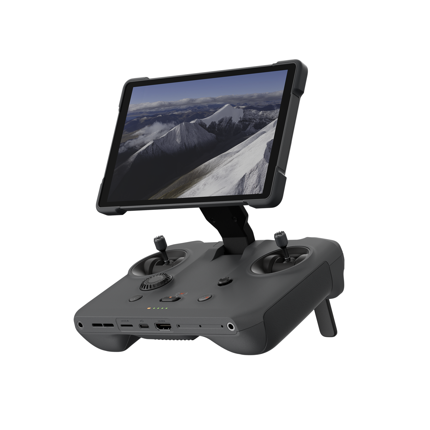 Black drone controller with a tablet, joysticks, and buttons. The tablet shows a mountain scene.