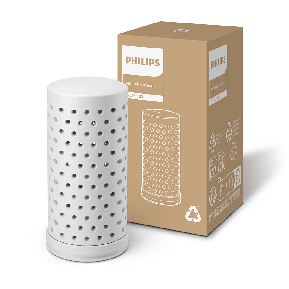 Fehér, lyukacsos henger alakú szűrő és egy barna doboz Philips logóval és 'Anti-calc cartridge' felirattal.