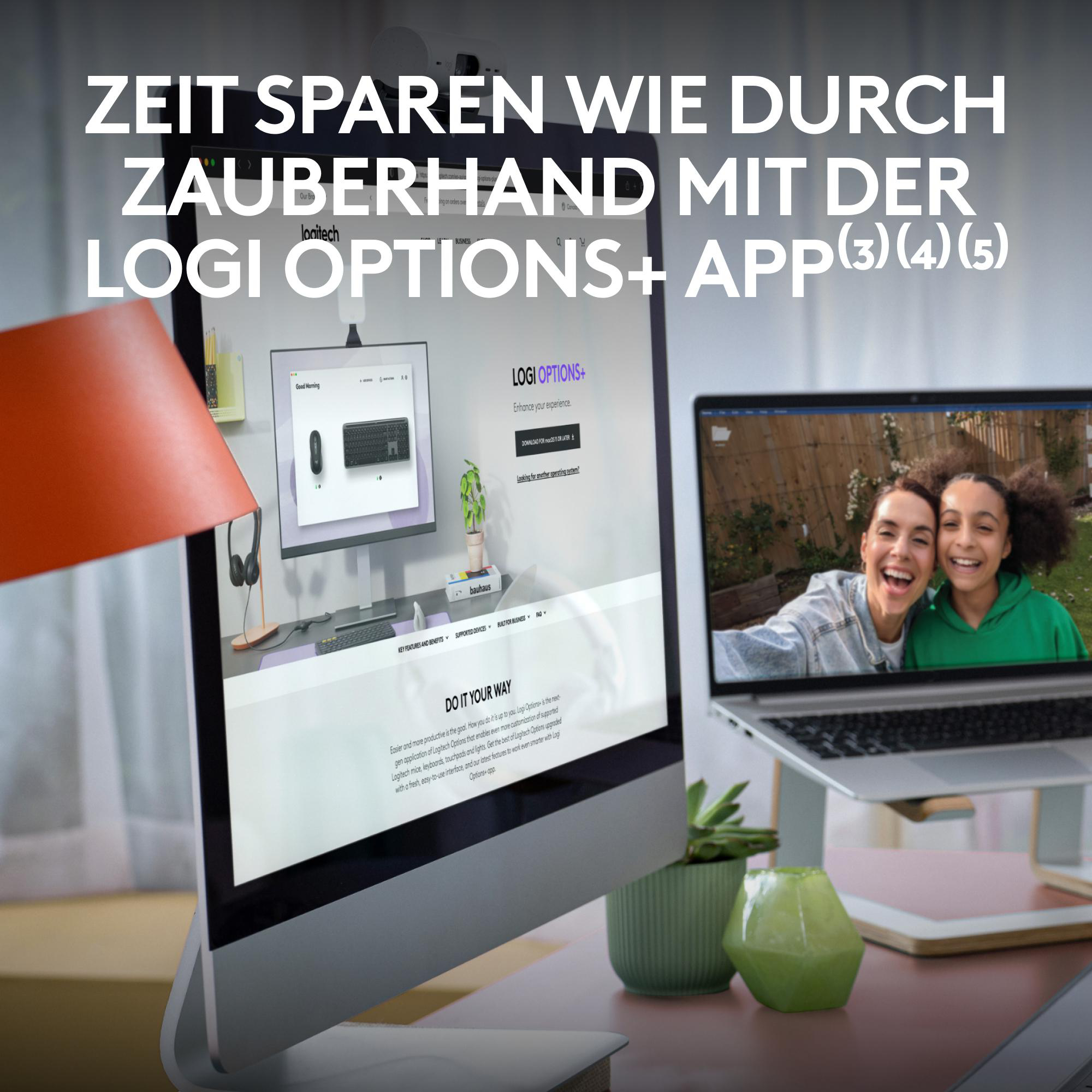 Ein Computerbildschirm und Laptop mit einer Frau und einem lächelnden Mädchen.