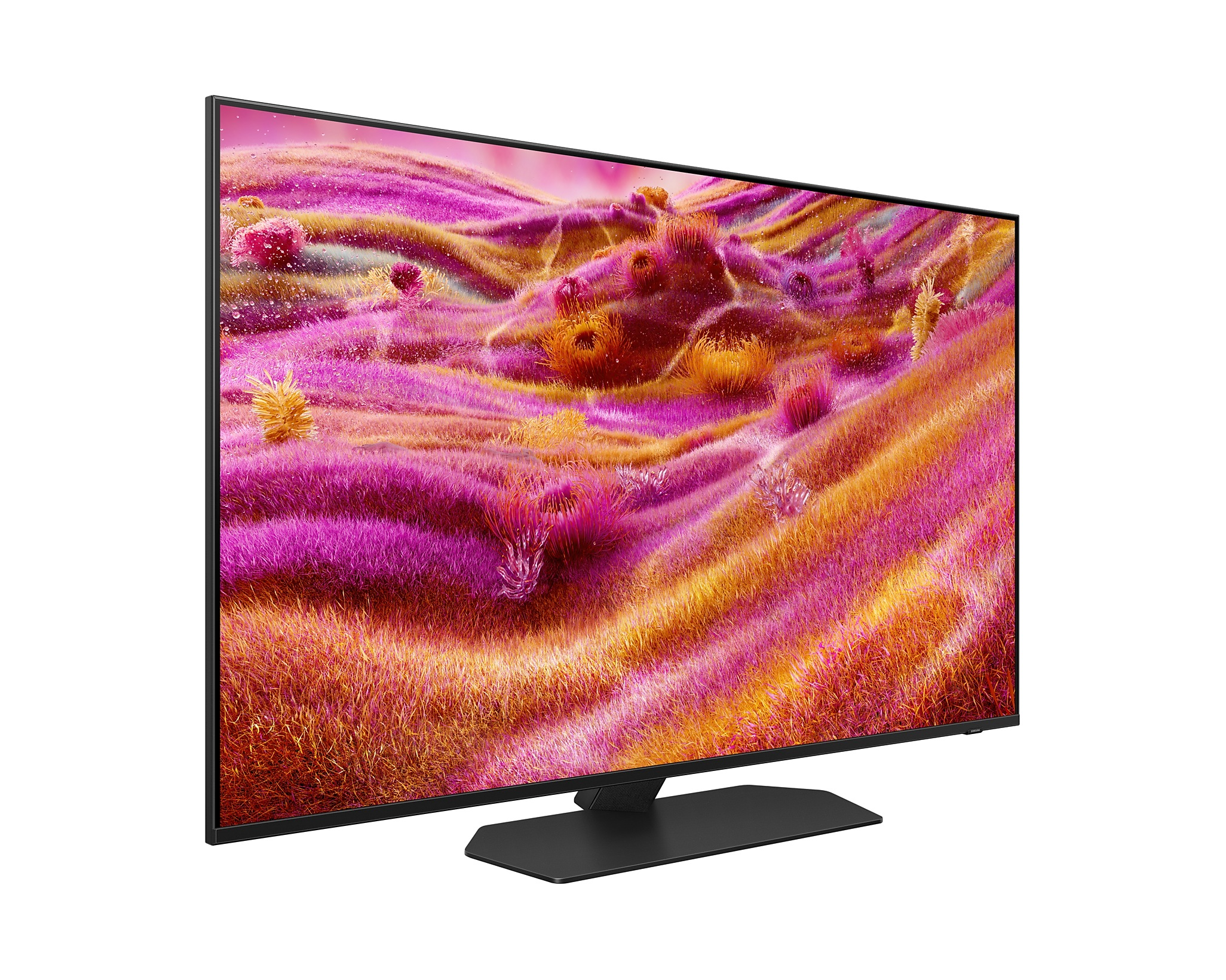 TV színes absztrakt művészettel, fekete kerettel és állvánnyal.
