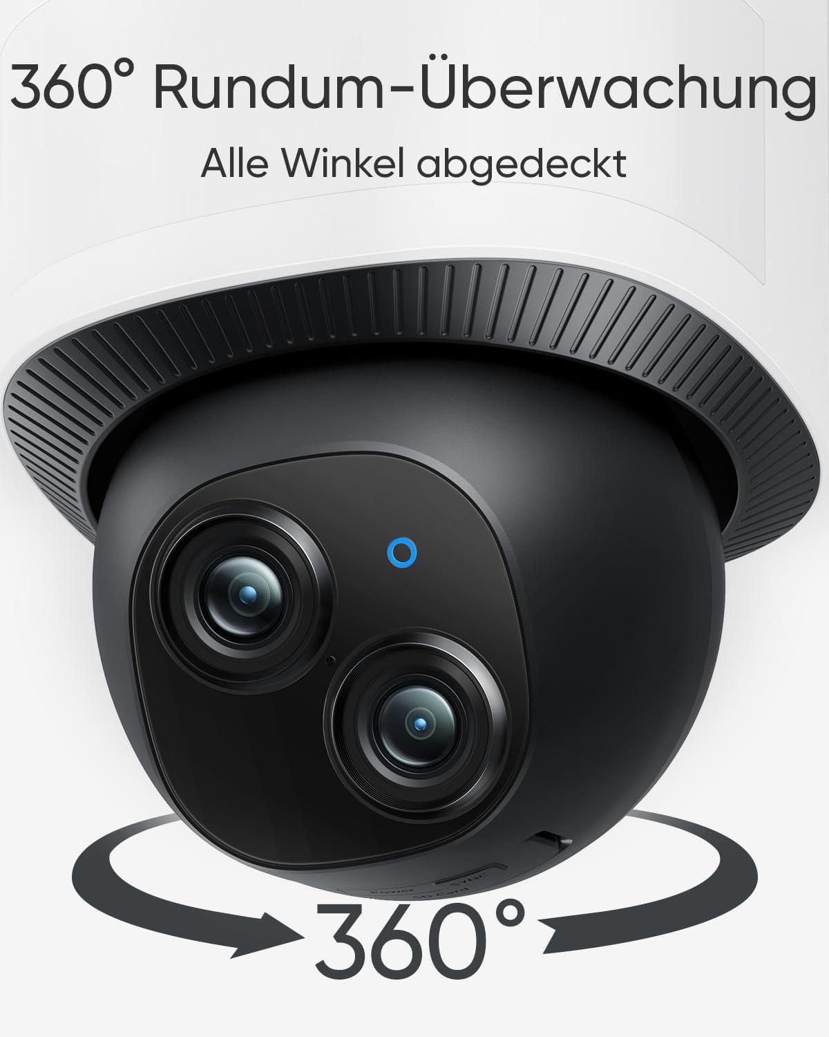 Nahaufnahme einer schwarzen Überwachungskamera mit zwei Linsen, umgeben von Text und Pfeilen.