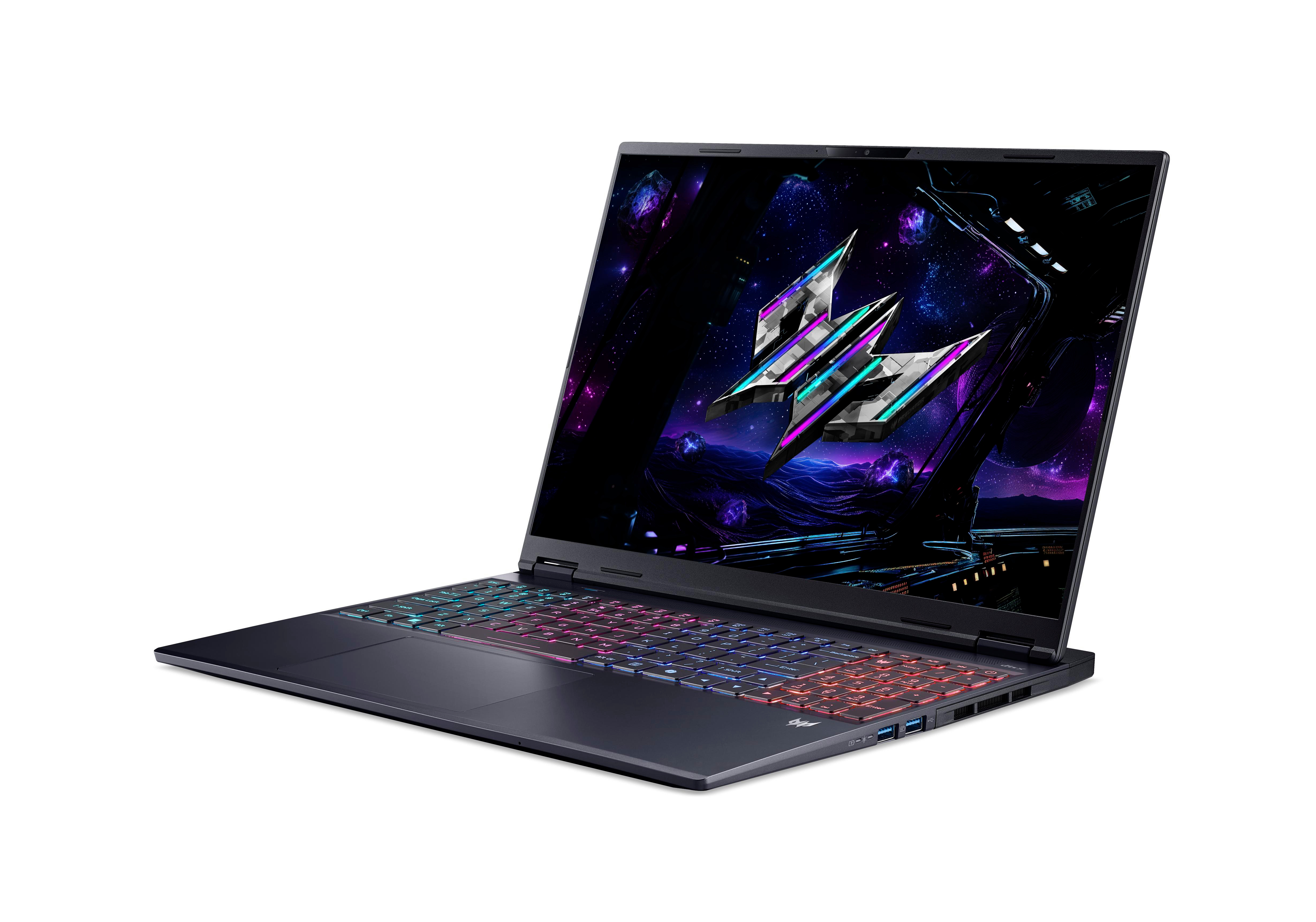 Geöffneter Laptop mit leuchtender Tastatur und Grafik auf dem Bildschirm.