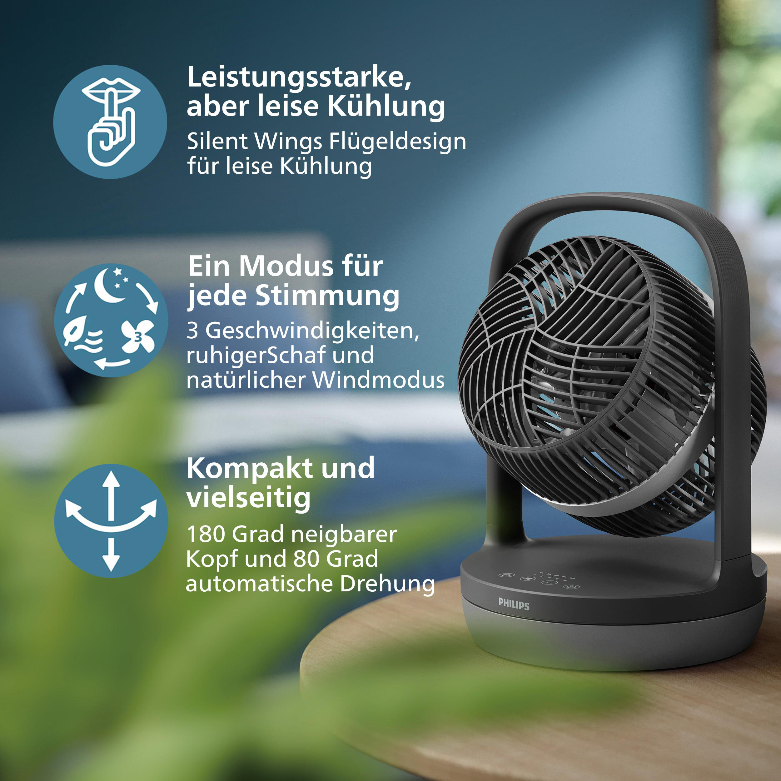 Schwarzer Ventilator auf Holztisch mit Infografiken.