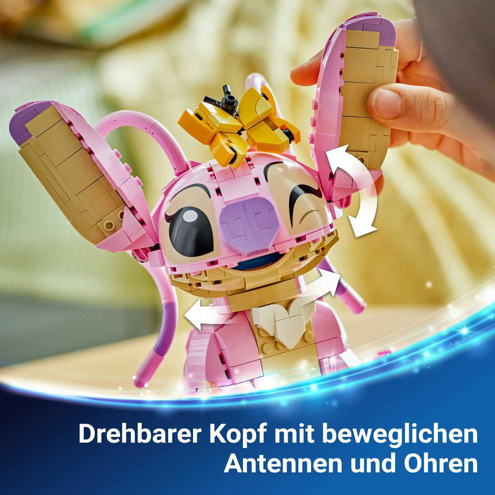 Nahaufnahme einer rosa Stitch-Figur aus Lego mit beweglichen Teilen und gelbem Kopfschmuck.