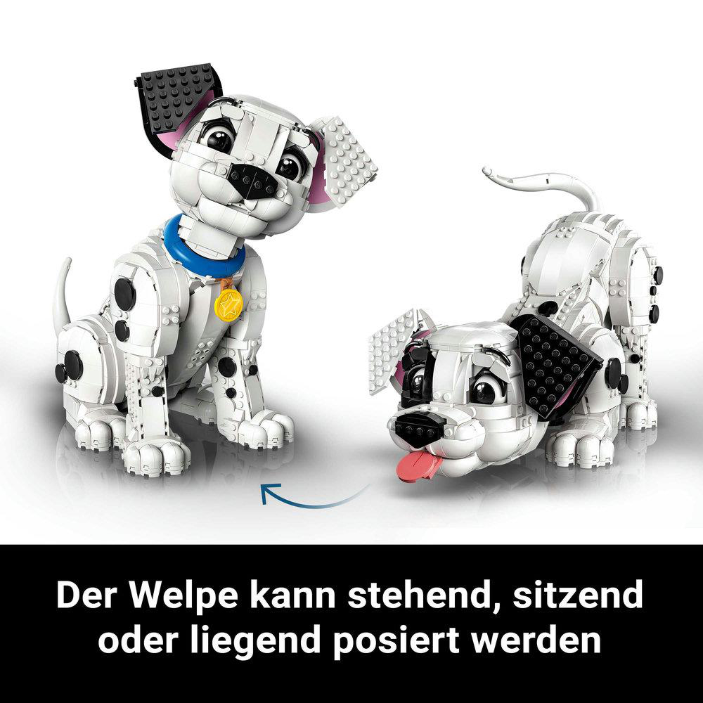 Zwei Lego Dalmatiner Welpen, einer stehend, einer liegend, beide weiß mit schwarzen Flecken.