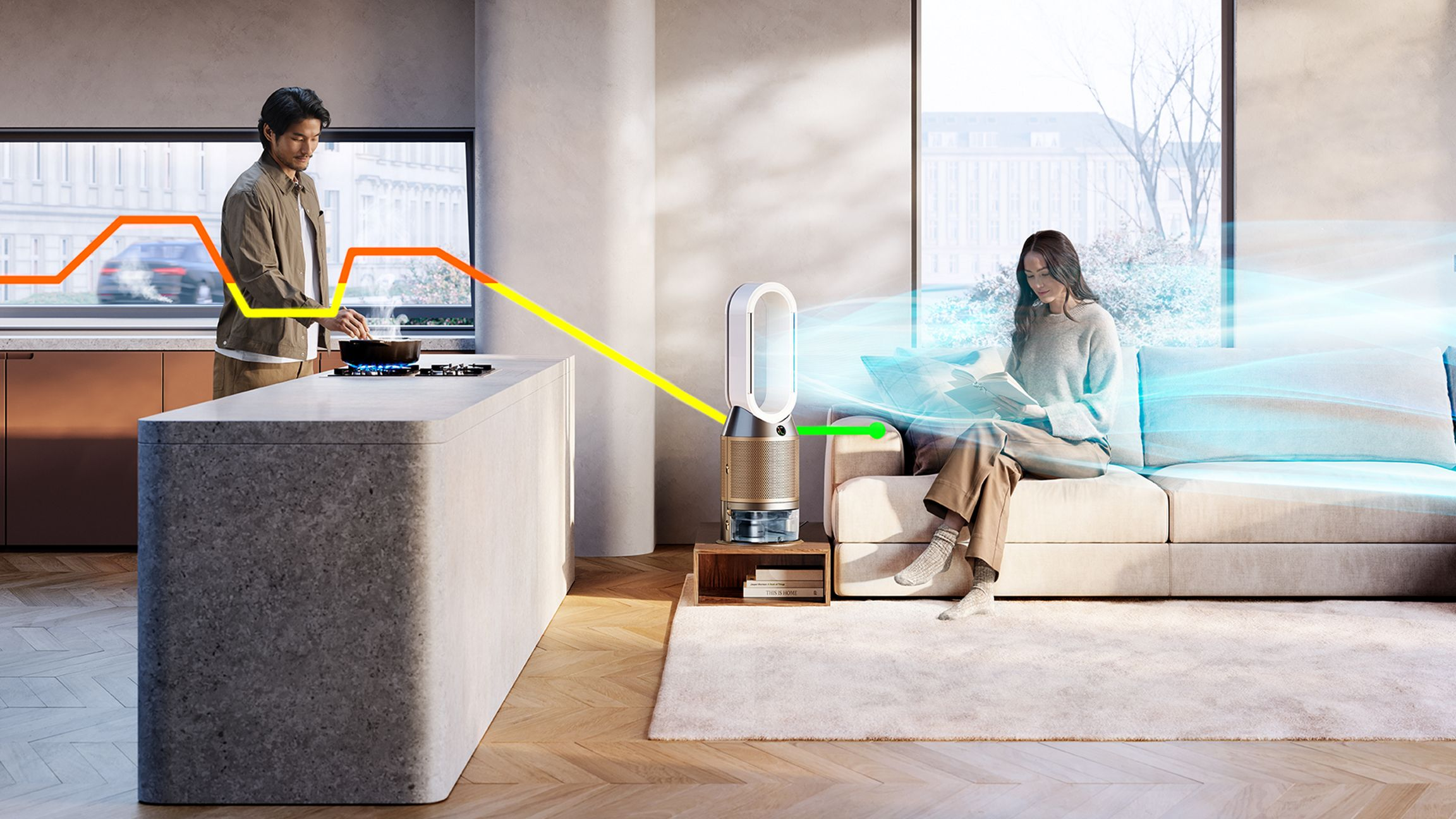 Un homme cuisine pendant qu'une femme lit ; un purificateur d'air Dyson filtre l'air.