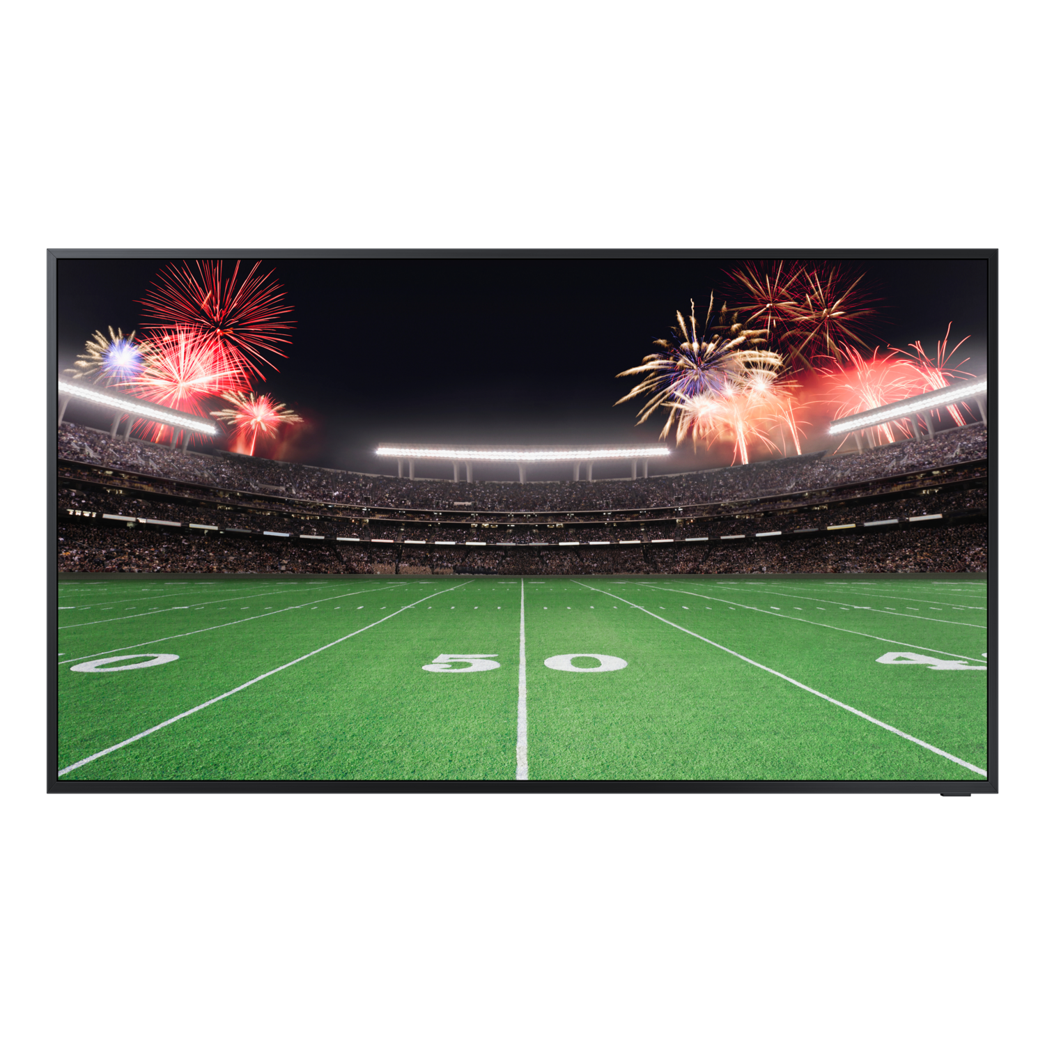 A television screen displays a football stadium at night with fireworks.