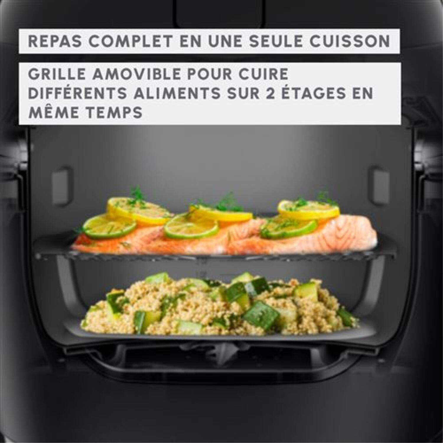 A black oven with two racks, cooking food on both levels.