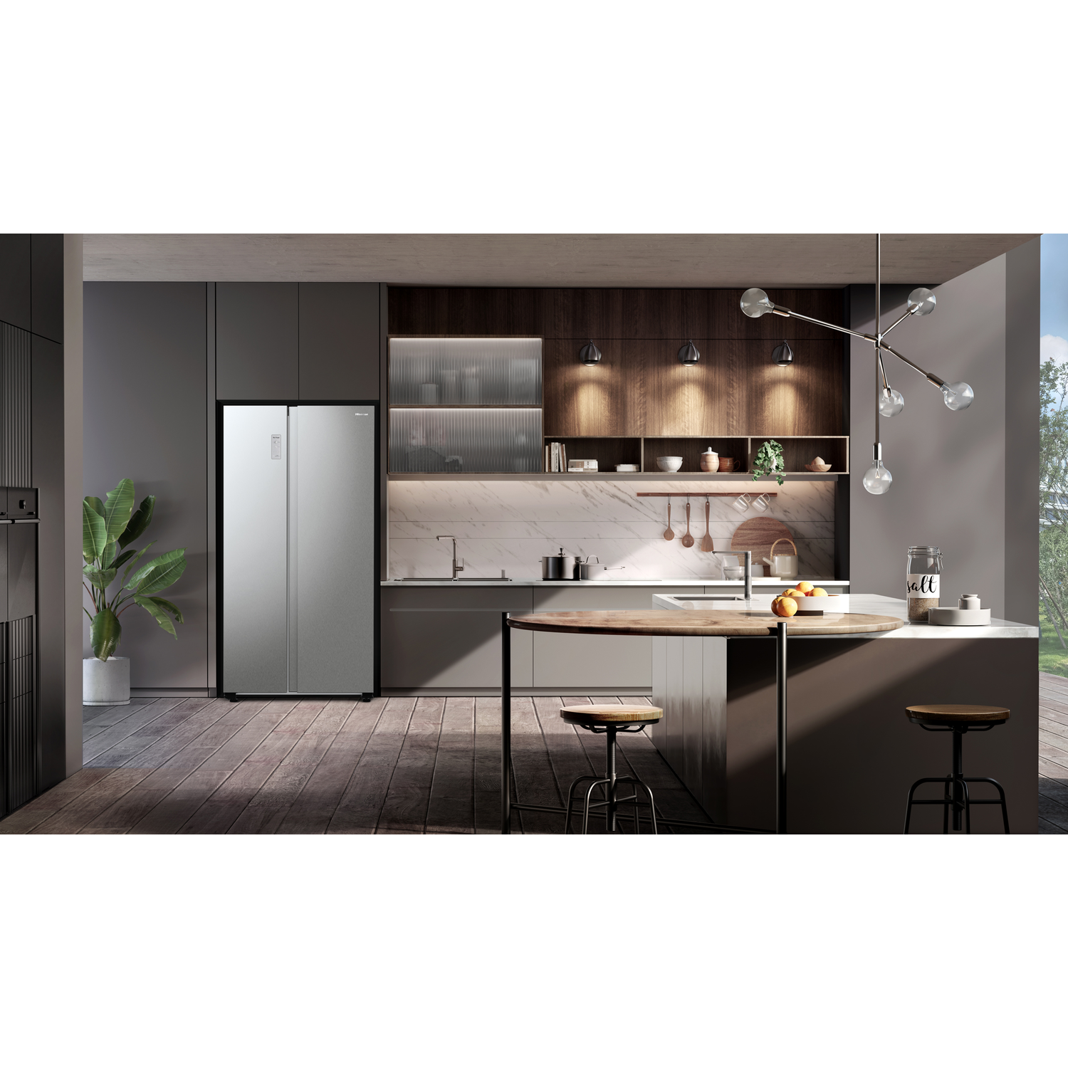 Modern kitchen setup with a silver side-by-side refrigerator and kitchen island.