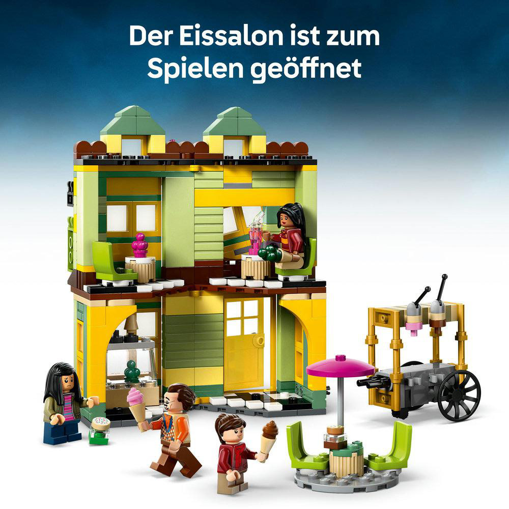 Buntes Lego-Eiscafé-Set mit Figuren, Eiswagen und Tisch im Freien.