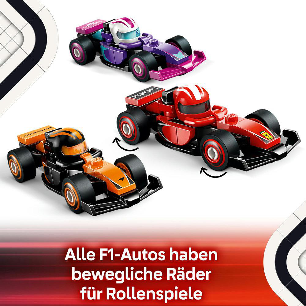 Drei F1-Autos in Lila, Rot und Orange mit beweglichen Rädern für Rollenspiele.