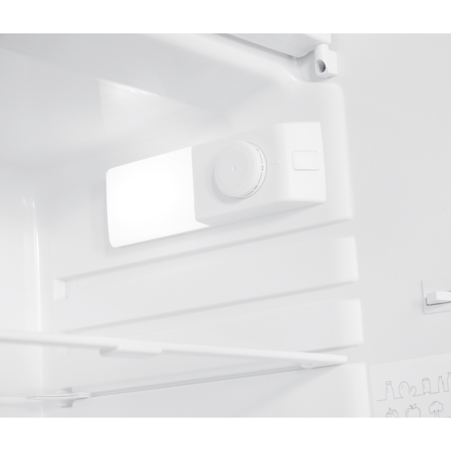 Inside a white refrigerator, a control panel with a dial is visible. Shelves and the interior walls are white.