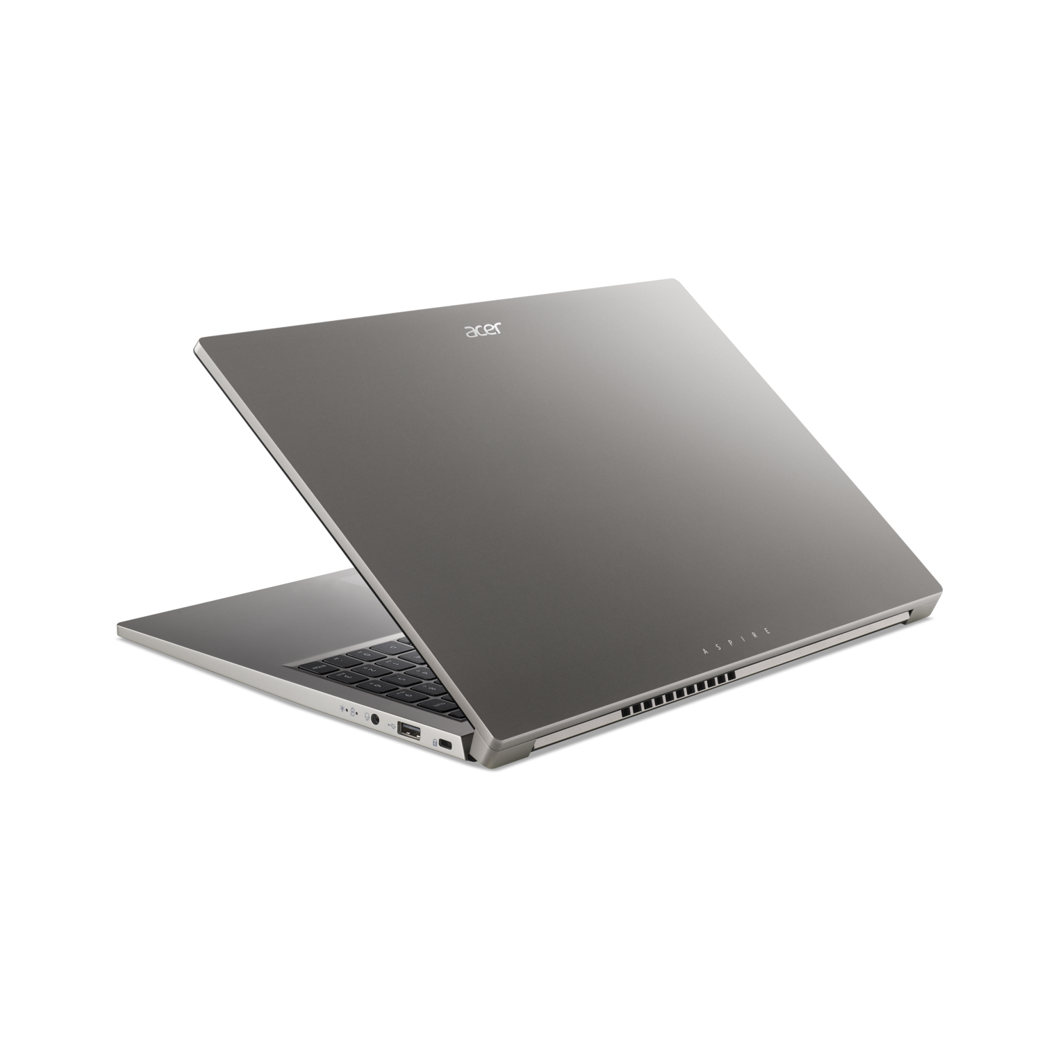 A silver Acer Aspire laptop is open on a black background. The screen is tilted upwards, with the keyboard visible.