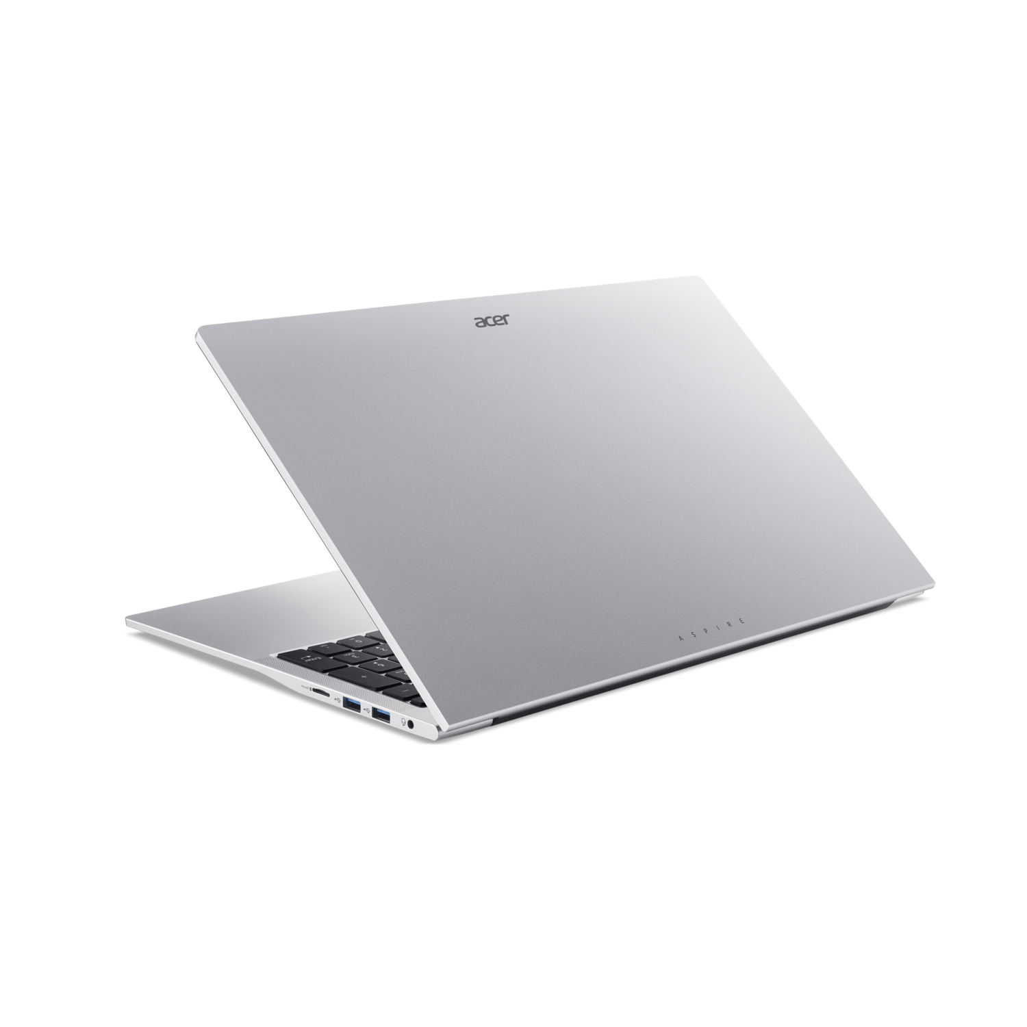 A silver Acer Aspire laptop is open, angled slightly. The keyboard is visible, and the screen is tilted up. The background is black.