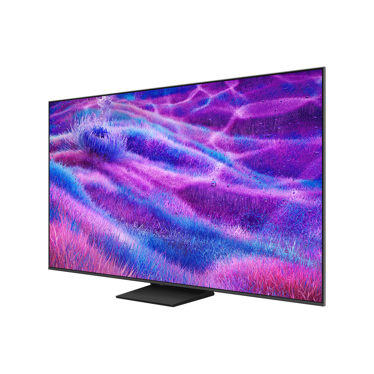 A large, angled TV displays a vibrant, abstract scene of purple, pink, and blue. It has a black stand and a thin bezel, set against a white backdrop.