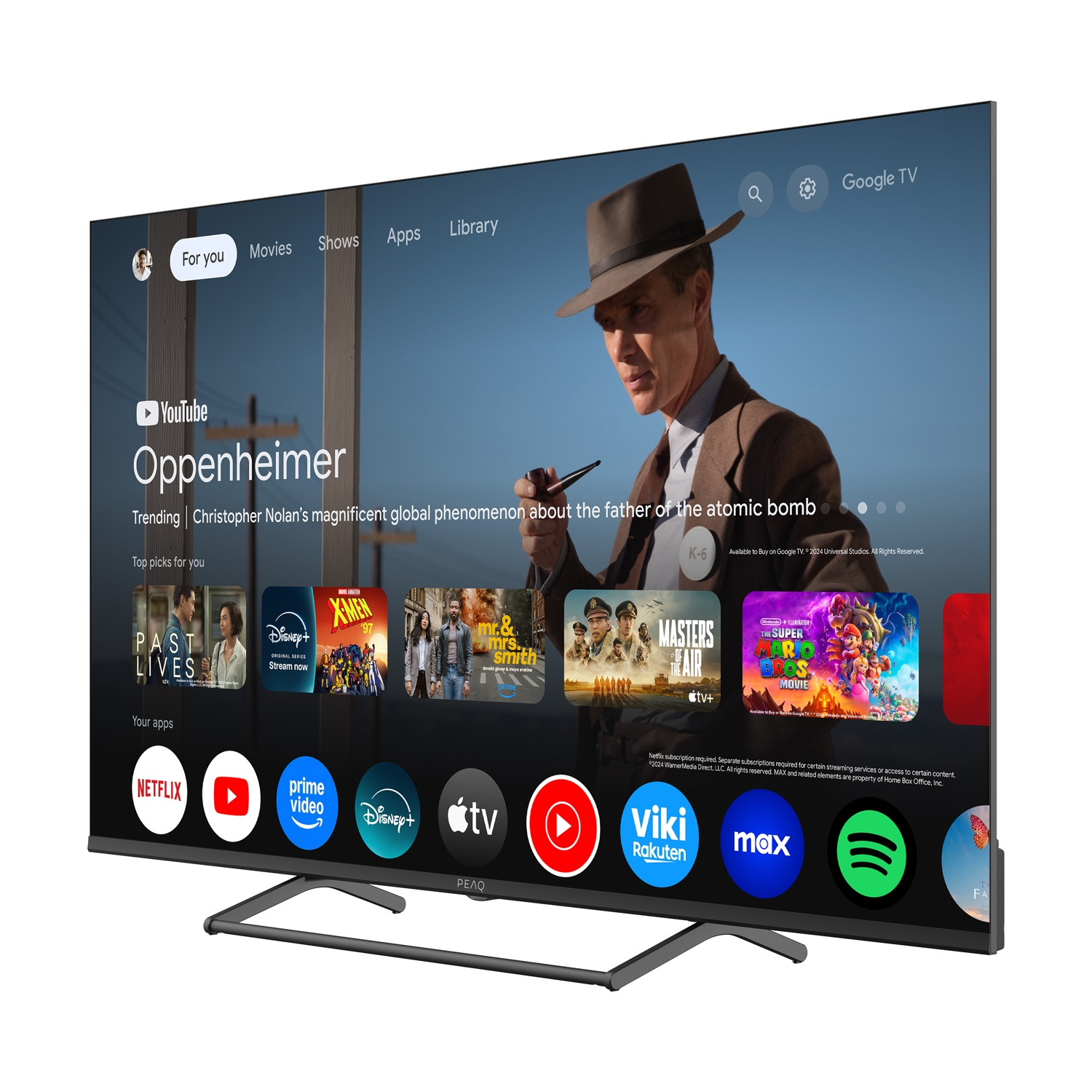 Un grande televisore mostra l'app di YouTube con Oppenheimer. Sono visibili anche altre app come Netflix, Disney+ e Max.