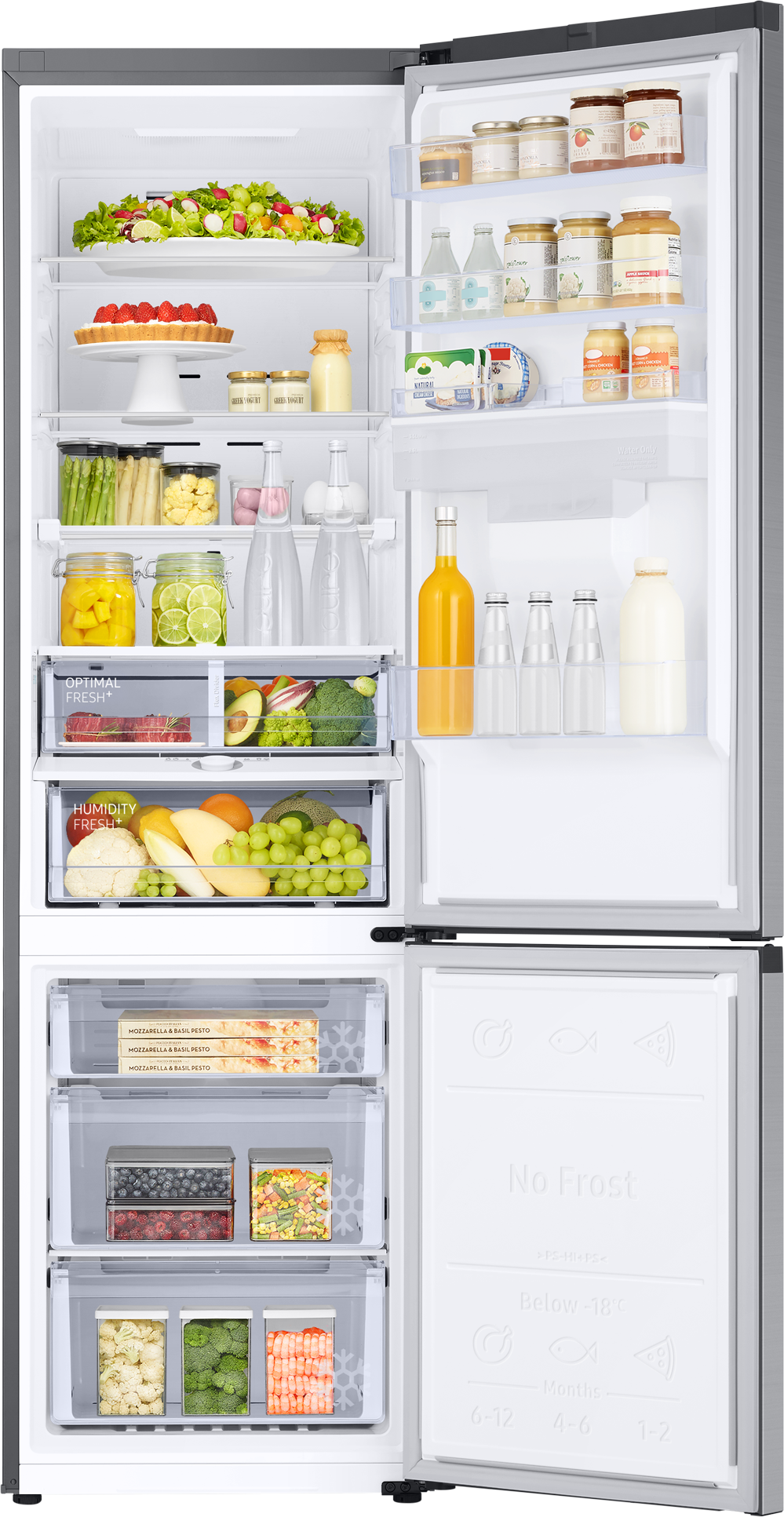 Open refrigerator filled with food items. Fruits, vegetables, drinks, and prepared meals are visible, organized in compartments.