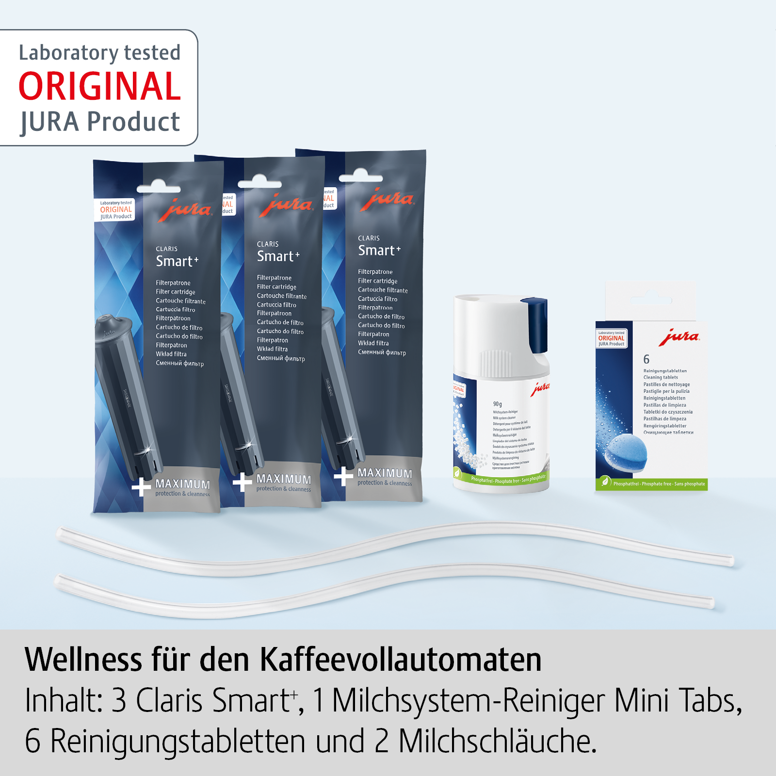 Produkt-Set: 3 CLARIS Smart+, Reinigungstabletten, Milchsystem-Reiniger und Milchschläuche. Oben steht "ORIGINAL JURA Product".