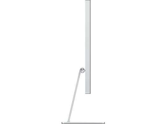 Vue latérale d'un moniteur Apple argenté avec support sur fond blanc.
