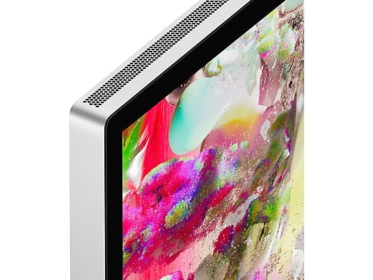 Gros plan sur un coin d'un moniteur Apple argenté avec un affichage coloré.