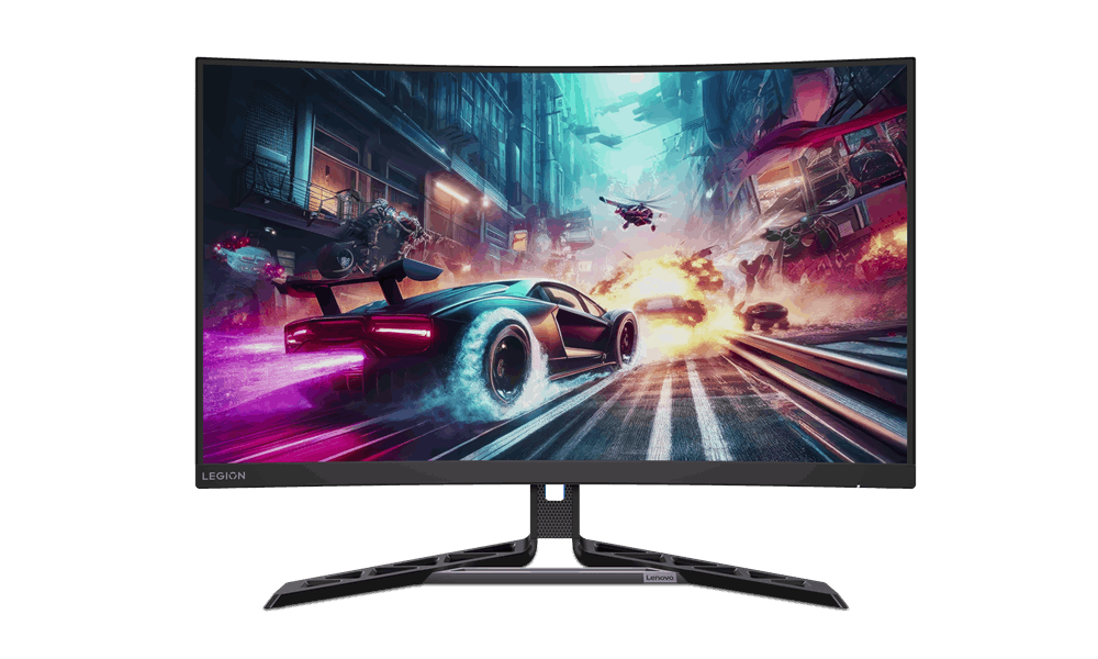 Un monitor curvo para juegos con un juego de carreras en la pantalla, sobre una mesa negra.