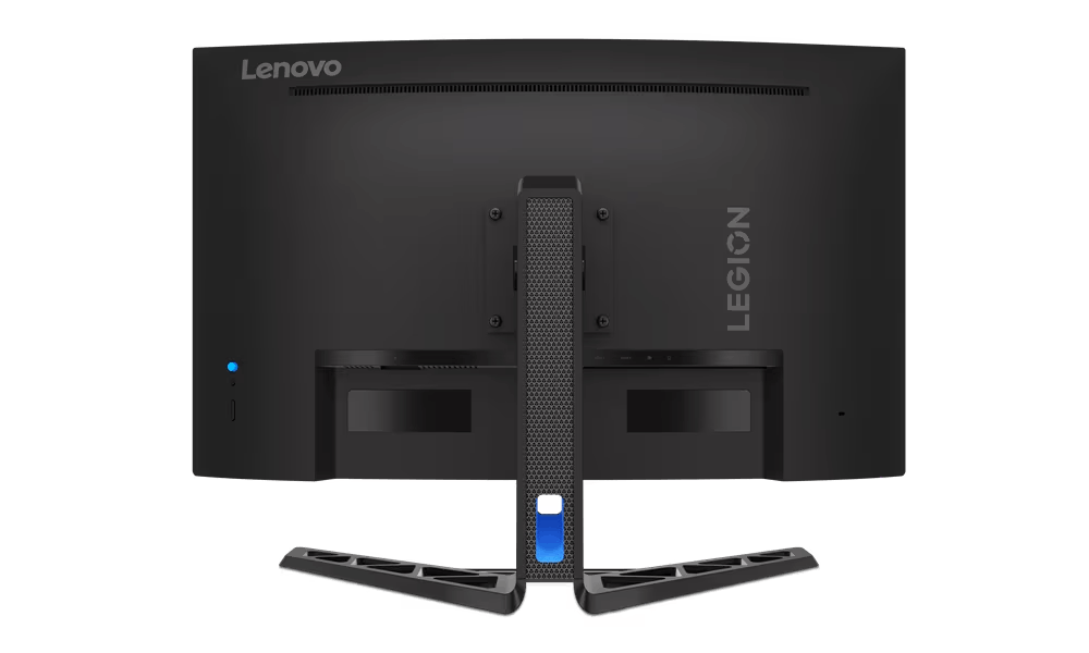Vista trasera del monitor Lenovo Legion negro. Incluye soporte, logotipo y marca Legion. Cuenta con indicador de encendido azul y puertos.