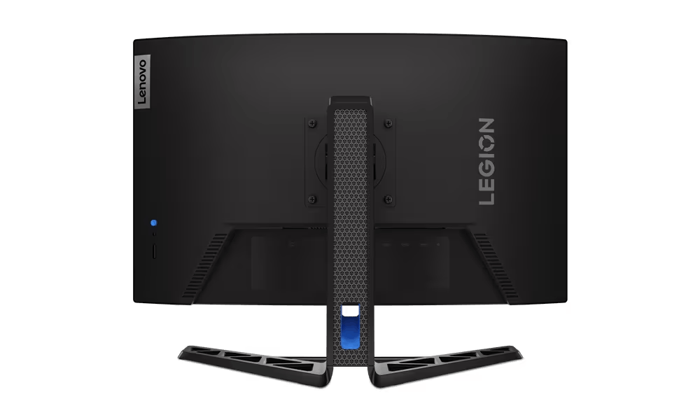 Parte trasera del monitor Lenovo Legion negro. Incluye soporte, logotipo Legion, logotipo Lenovo y patrón de panal. Fondo oscuro.