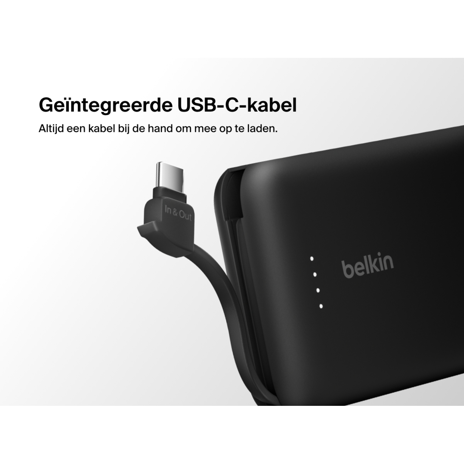 Close-up of a black Belkin power bank with an integrated USB-C cable.