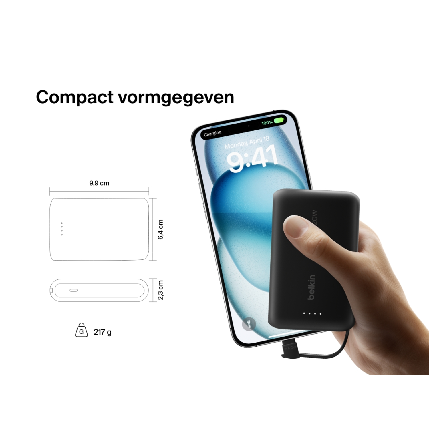 A hand holding a black Belkin power bank next to an iPhone being charged.