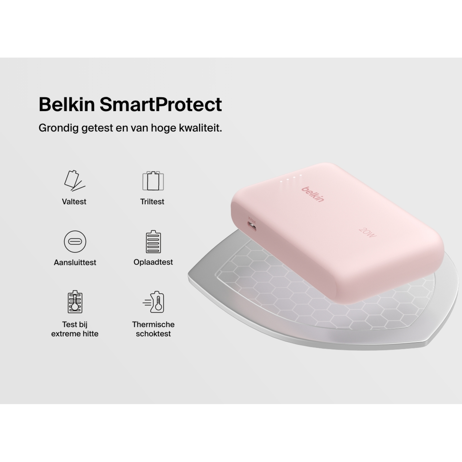 Pink power bank on a silver surface with symbols for tests.