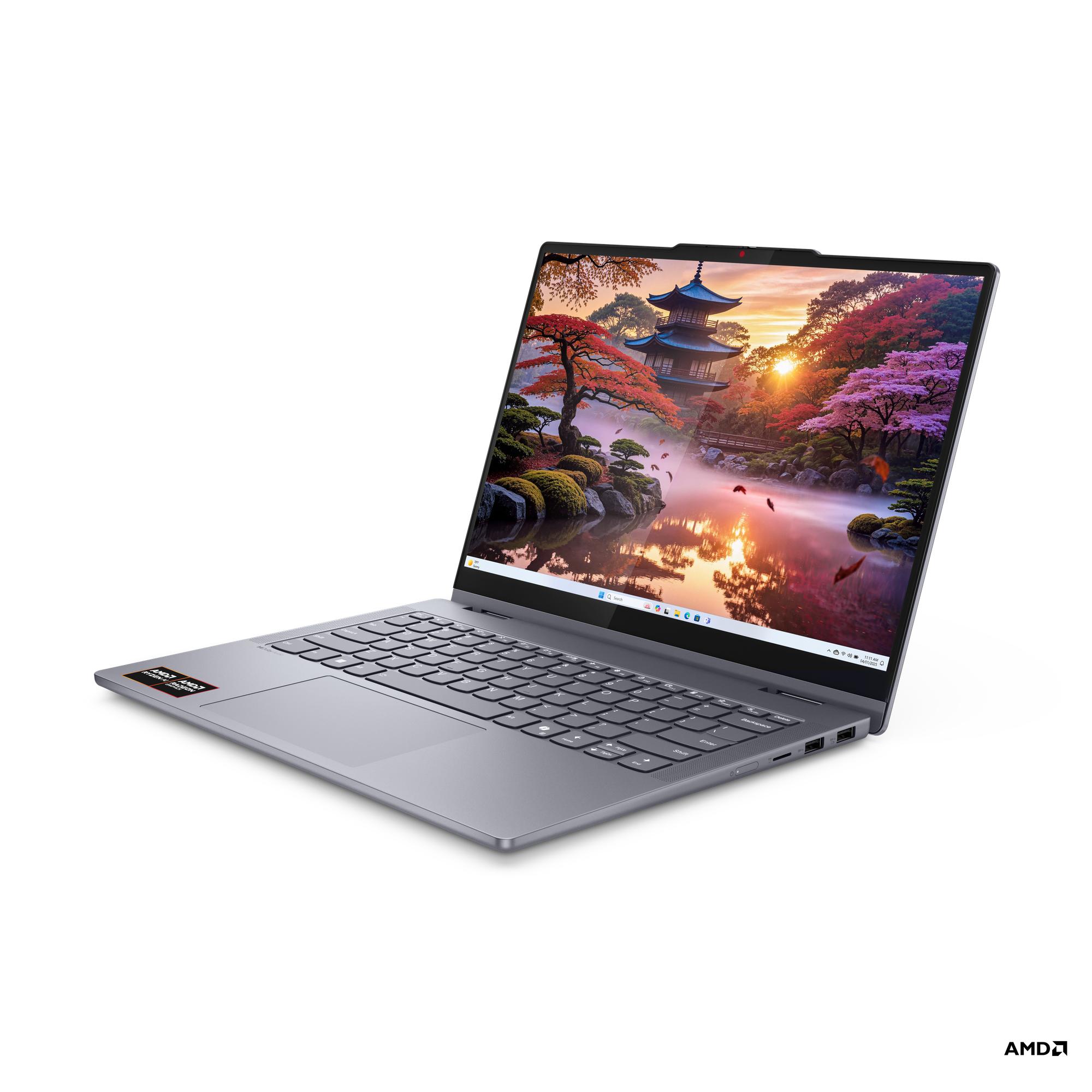 Manzara gösteren açık ekranlı koyu gri laptop. Siyah arka plan.