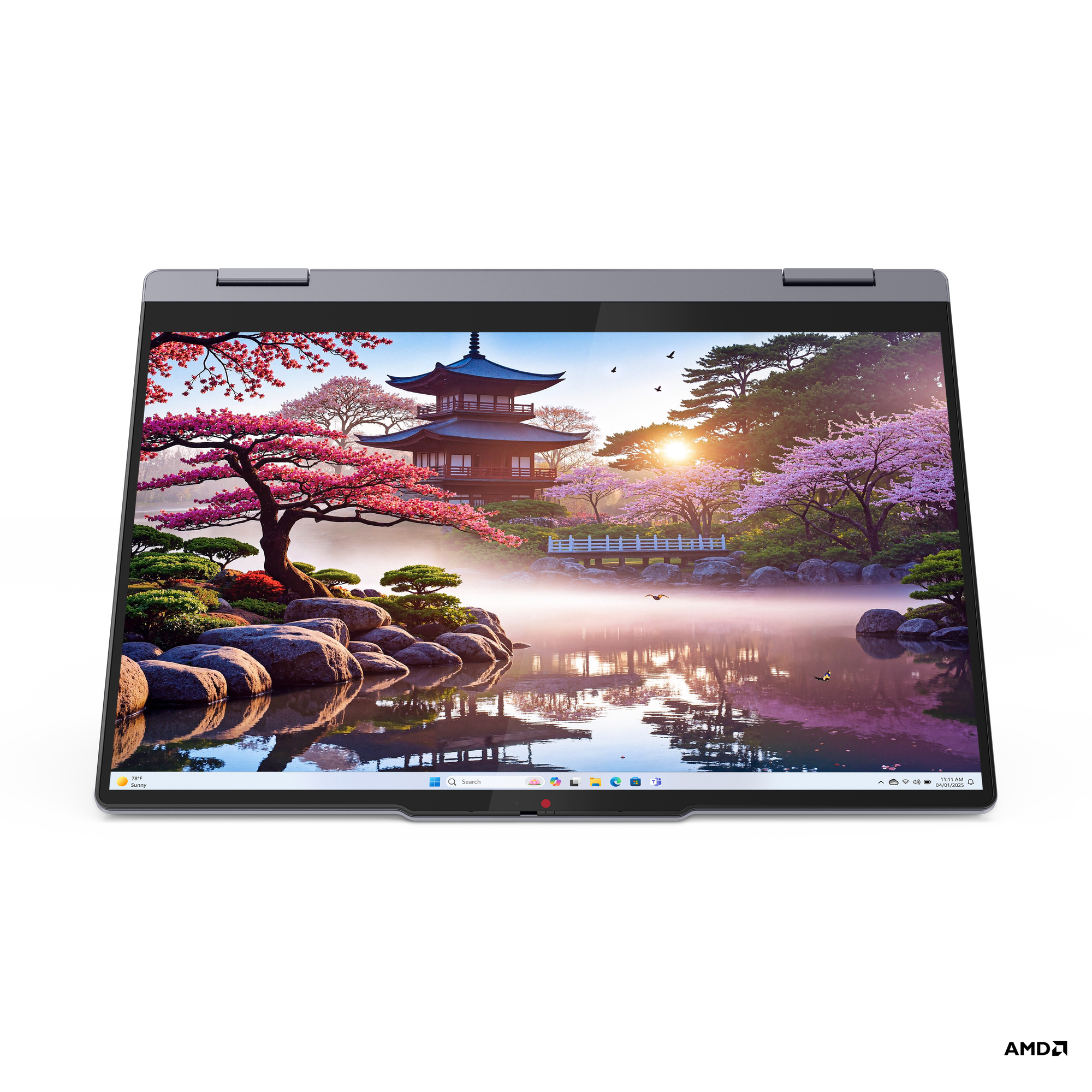 Manzara gösteren açık ekranlı koyu gri laptop. Siyah arka plan.