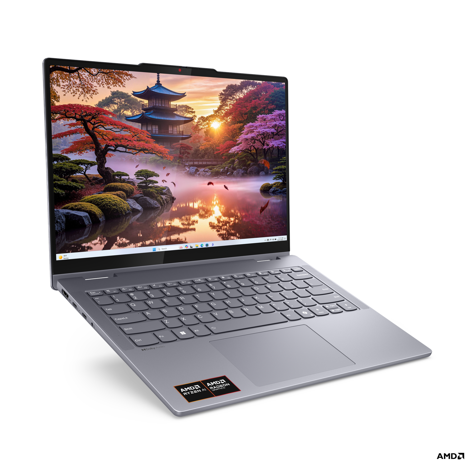 Manzara gösteren açık ekranlı koyu gri laptop. Siyah arka plan.