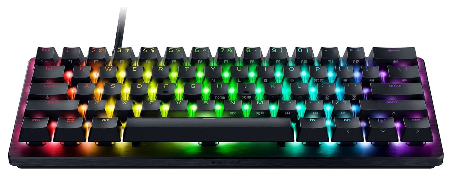 Podświetlana klawiatura z kolorowymi klawiszami, leżąca na białym tle. Widoczne logo Razer.