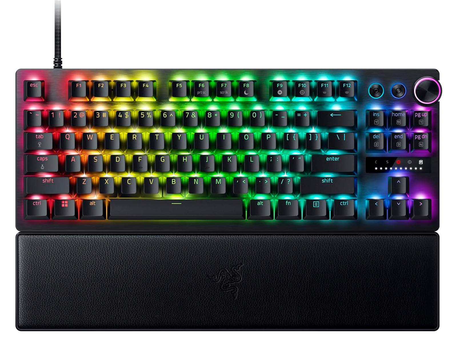 Klawiatura z kolorowym podświetleniem i podpórką pod nadgarstek. Klawisze są podświetlane w kolorach tęczy, obudowa jest ciemnoszara.