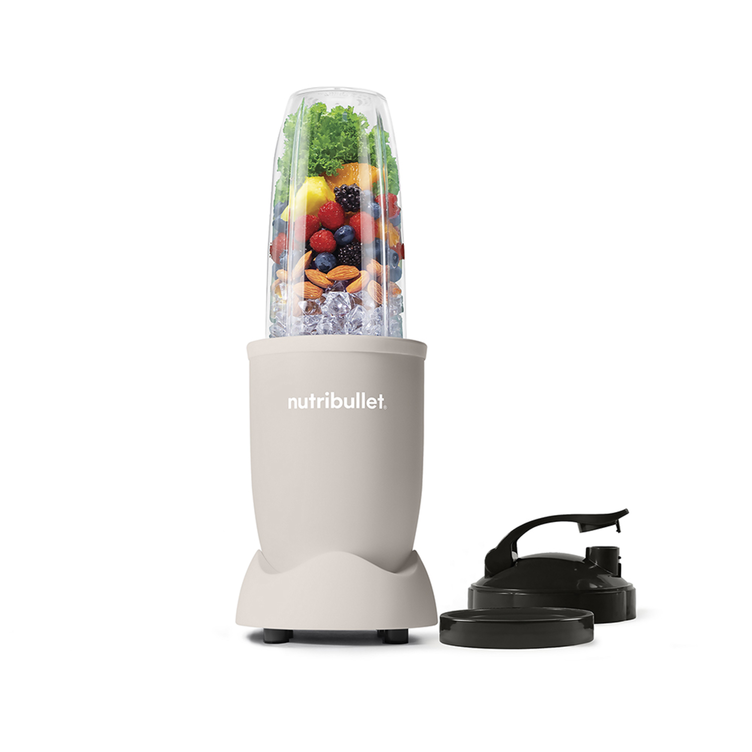 A cream-colored Nutribullet blender with fruits and ice cubes, accessories beside it, on white background.