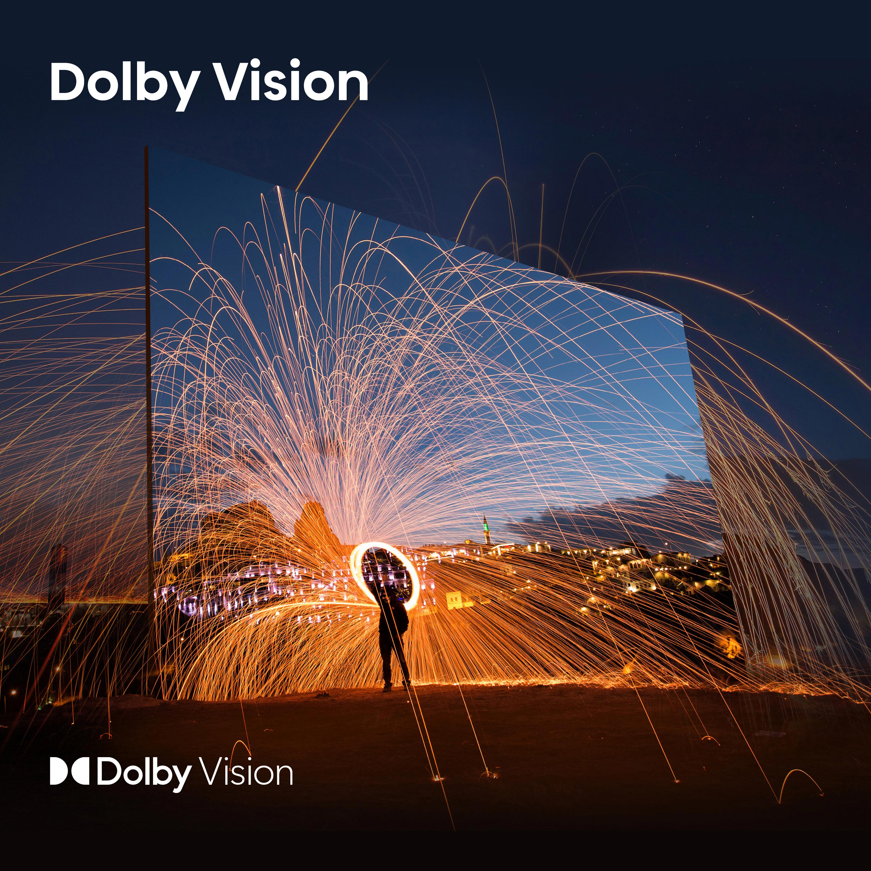 Egy éjszakai jelenet tűzijátékkal, a Dolby Visionnel ábrázolva, egy logóval.