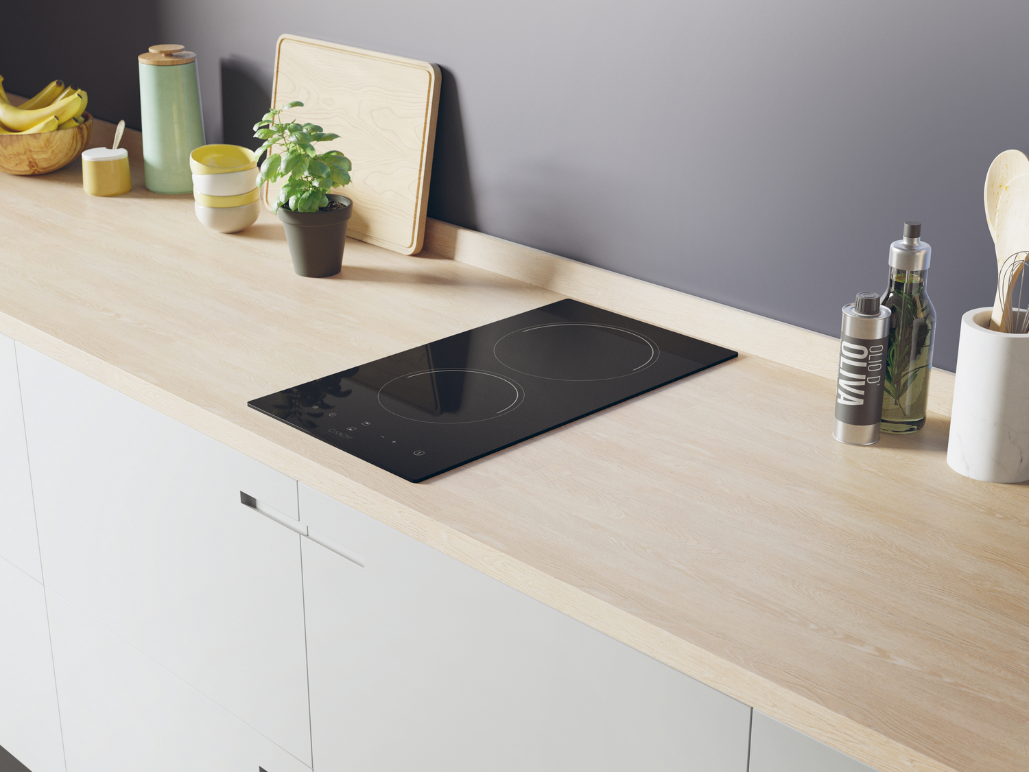 Placa de cocina en encimera de madera, con utensilios y alimentos. Armarios blancos abajo, pared gris.