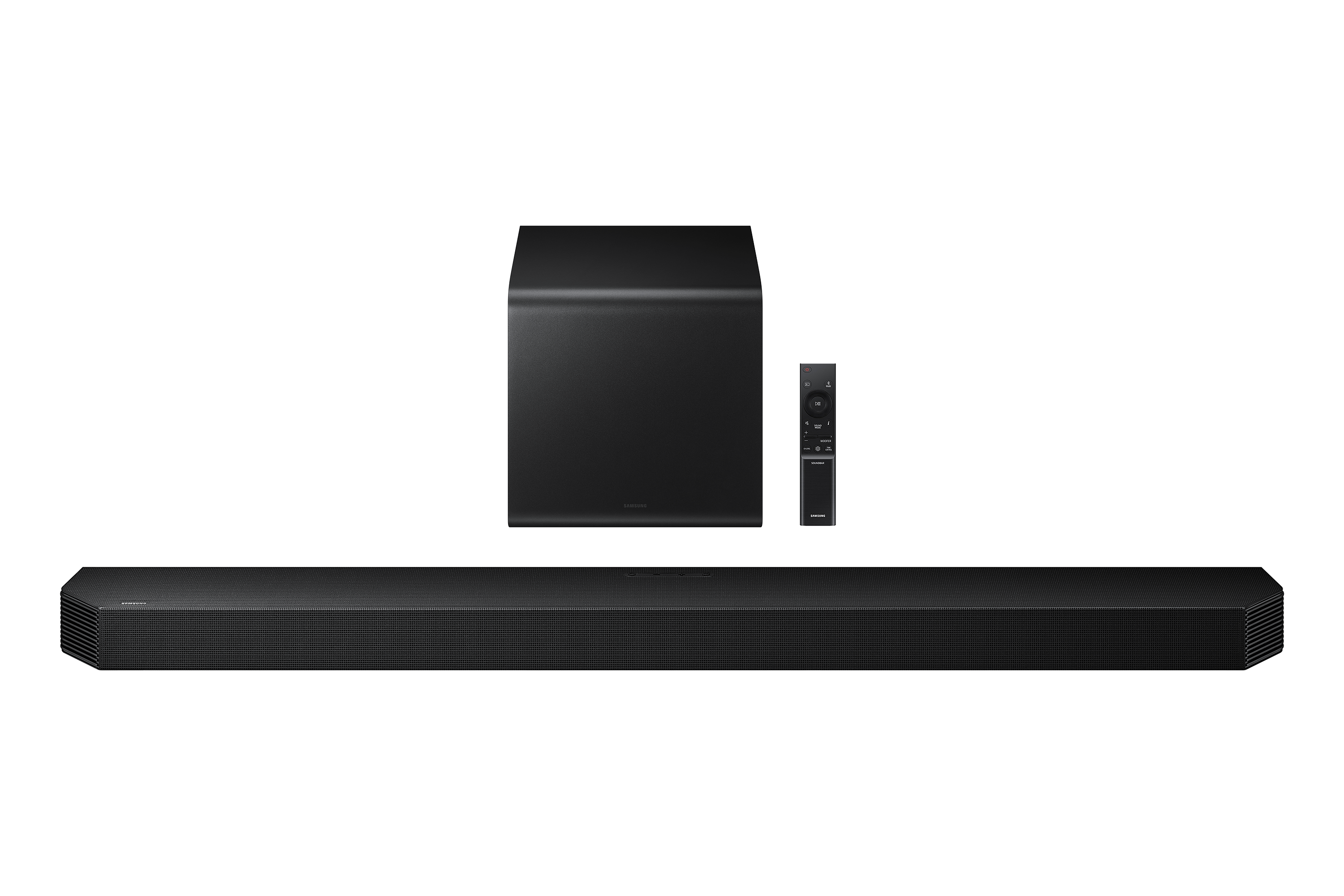 Schwarzes Soundbarsystem, Subwoofer und Fernbedienung auf schwarzem Hintergrund.
