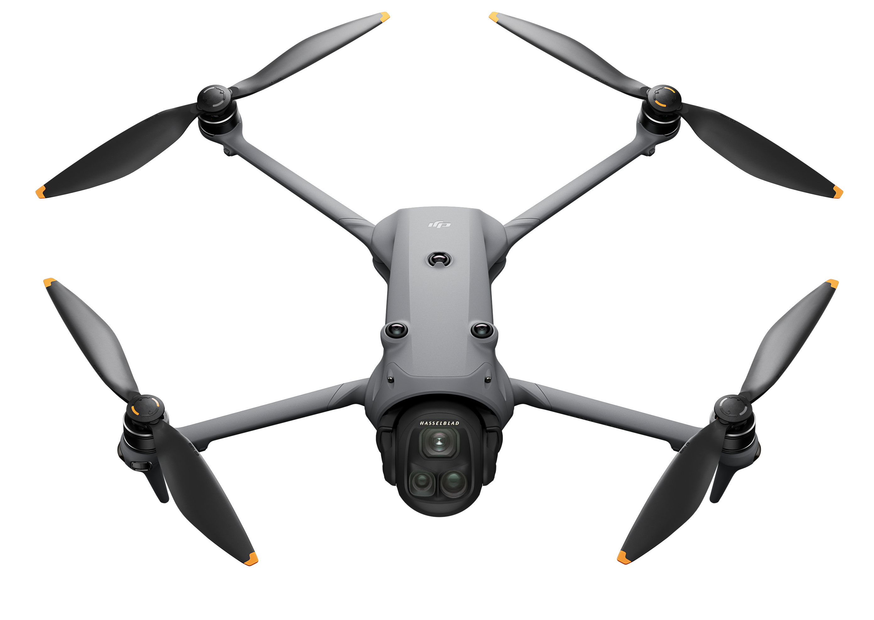 Dron z góry, szary korpus, czarne śmigła, czarne tło.