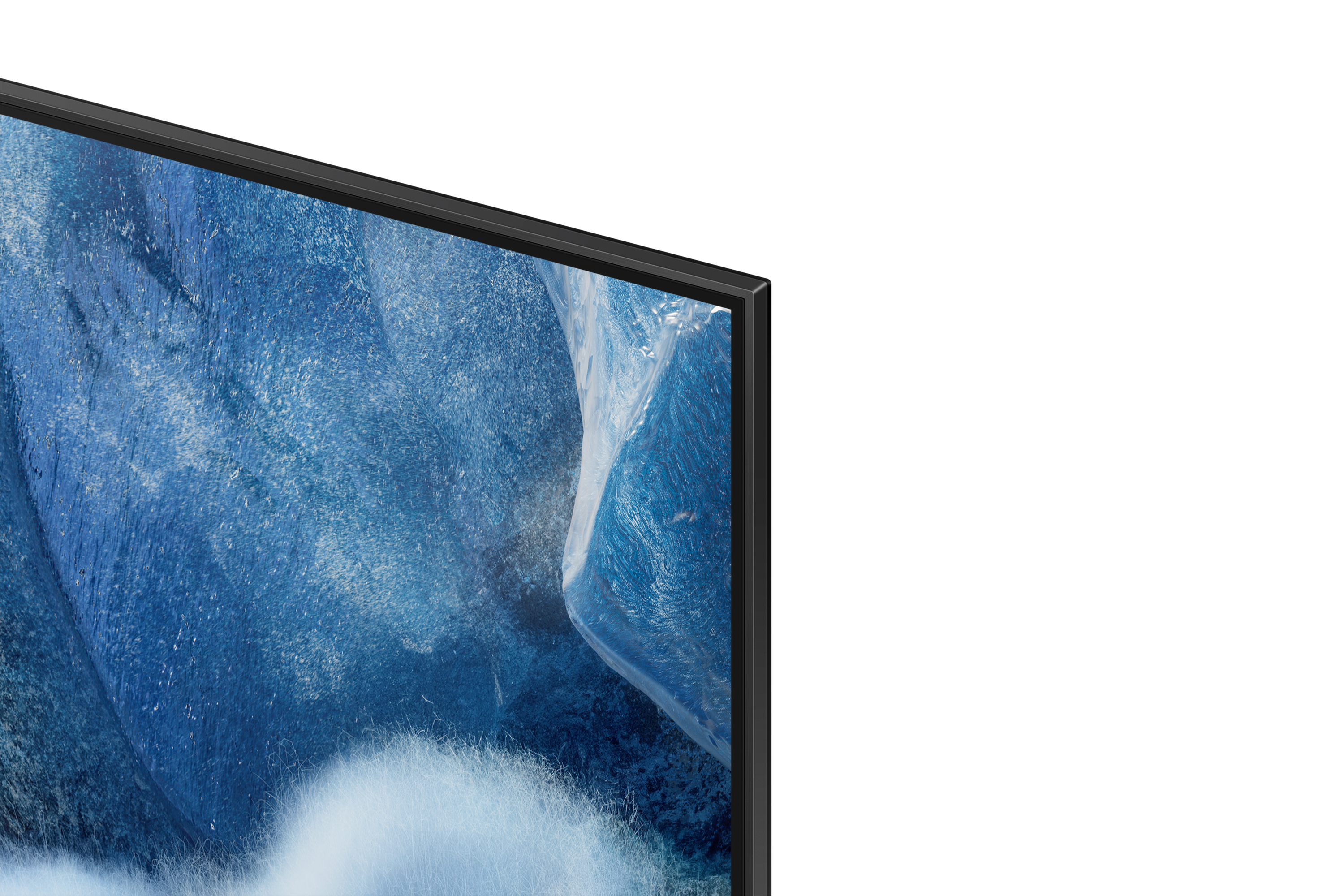 Nahaufnahme einer Ecke eines Fernsehers mit blauem Hintergrund und schwarzem Rahmen.