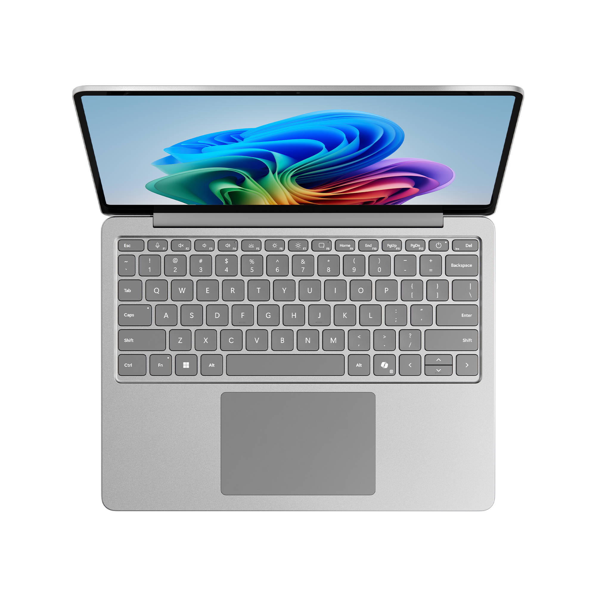 Draufsicht auf ein silbernes Laptop mit geöffnetem Bildschirm und Tastatur.