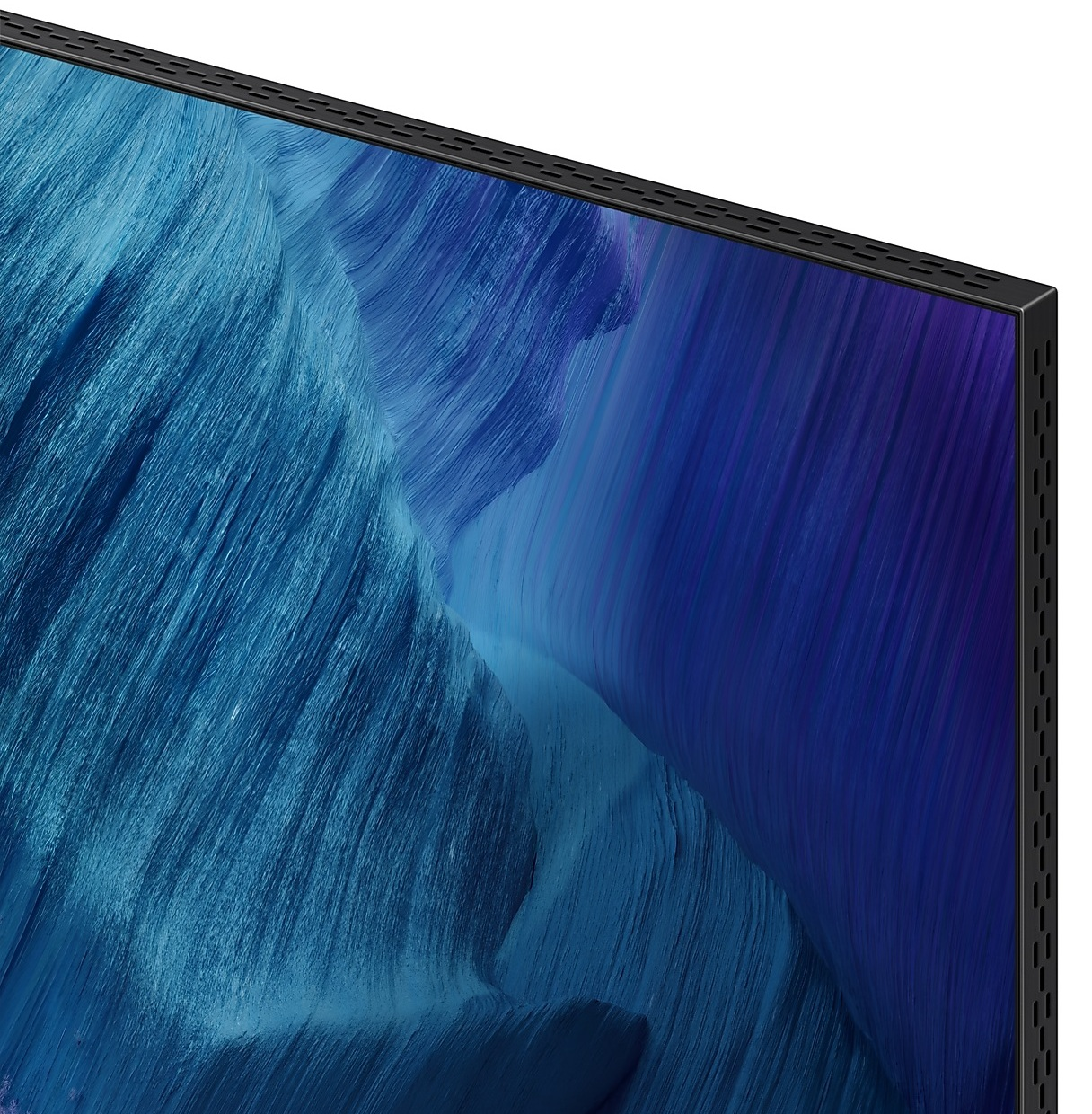 Zbliżenie ekranu telewizora z kolorowym, abstrakcyjnym tłem.